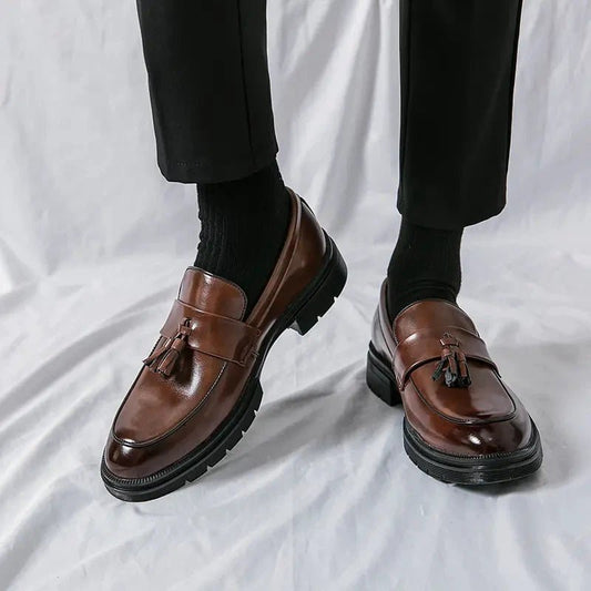 Men's elegant breathable tassel loafers by MANDOTOS, featuring sleek design and comfortable leather upper.