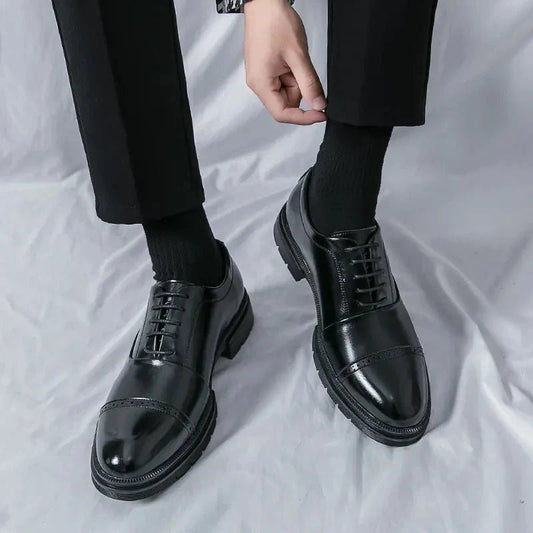 Men's elegant breathable tassel loafers by MANDOTOS featuring leather upper, classic design, and comfortable slip-on style.