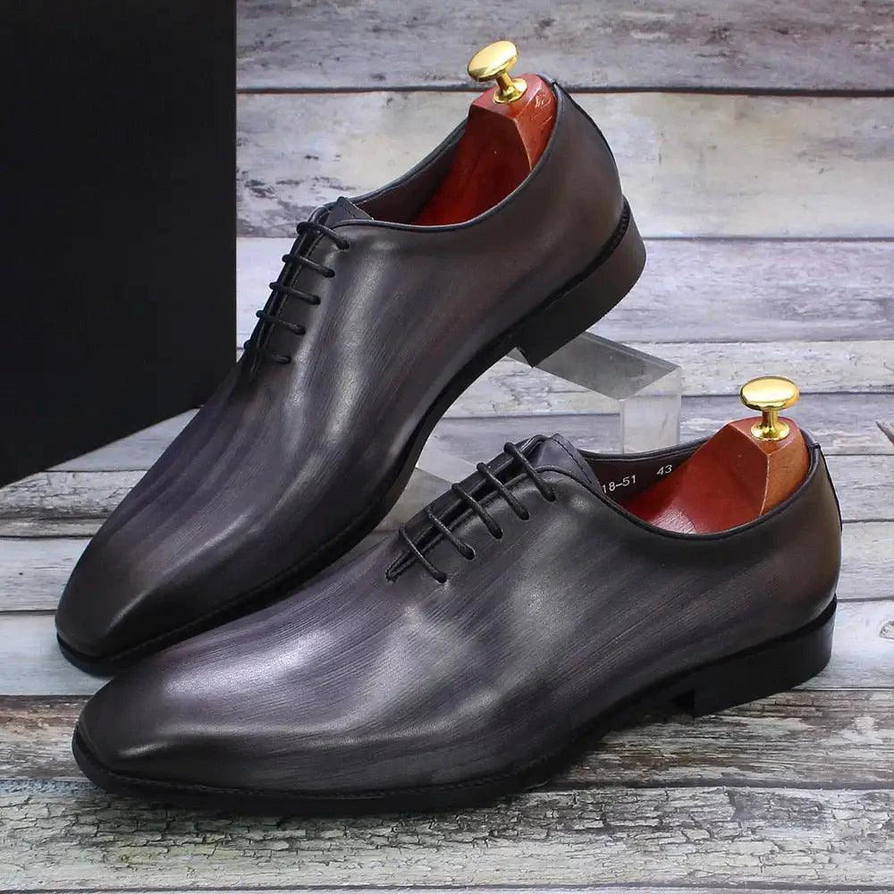 Men's leather Oxford shoes by MANDOTOS, featuring classic design with polished brown leather and lace-up front.