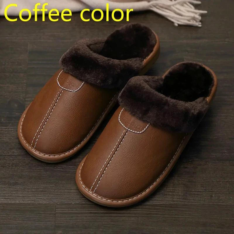 Men's luxury leather slippers by MANDOTOS featuring soft leather uppers and comfortable slip-on design.