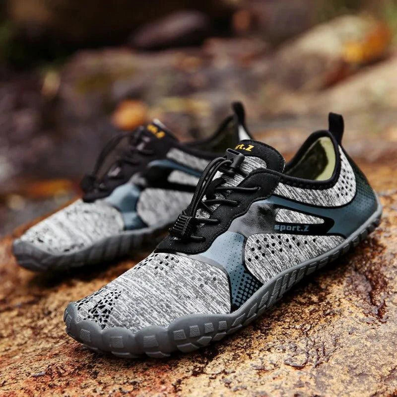 Mandotos outdoor hiking shoes with rugged soles and breathable fabric, designed for outdoor trekking and trail walking.
