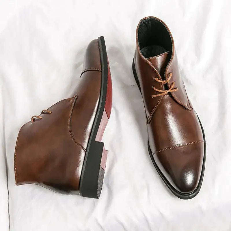 Red Bottom Leather Boots by MANDOTOS featuring sleek design and stylish leather construction.