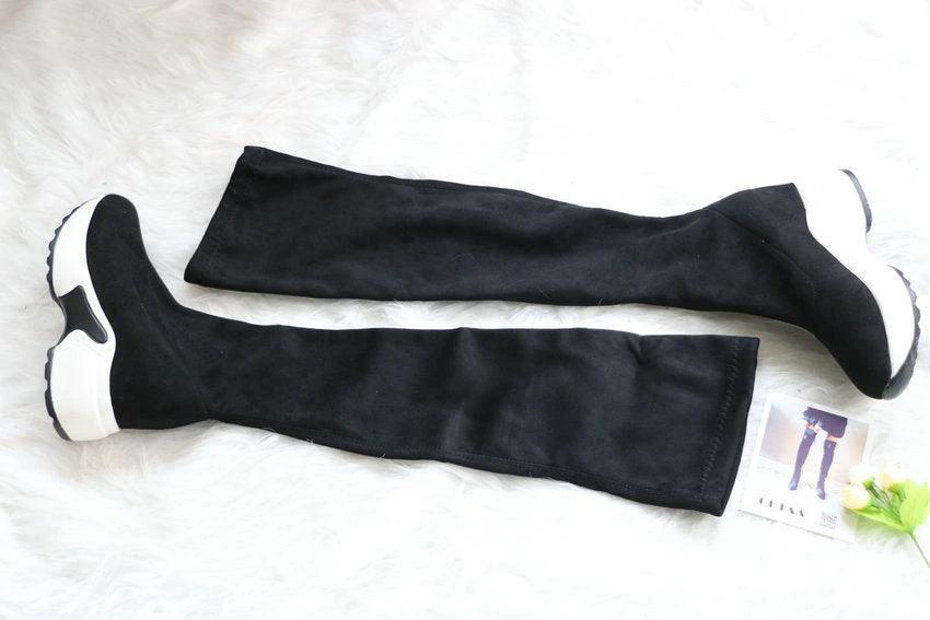 Mandotos round toe sports high heel over-the-knee boots in black with sleek design and chunky heel.