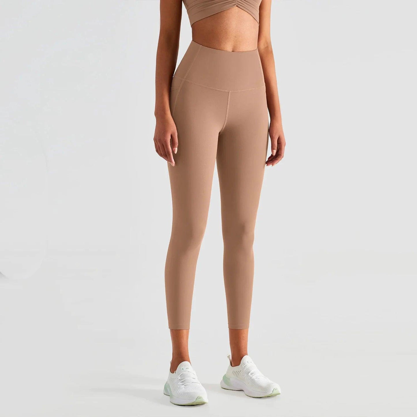 Mandotos ShapeEnhance activewear leggings in black with high-waist design and stretch fabric, suitable for workout and fitness activities.