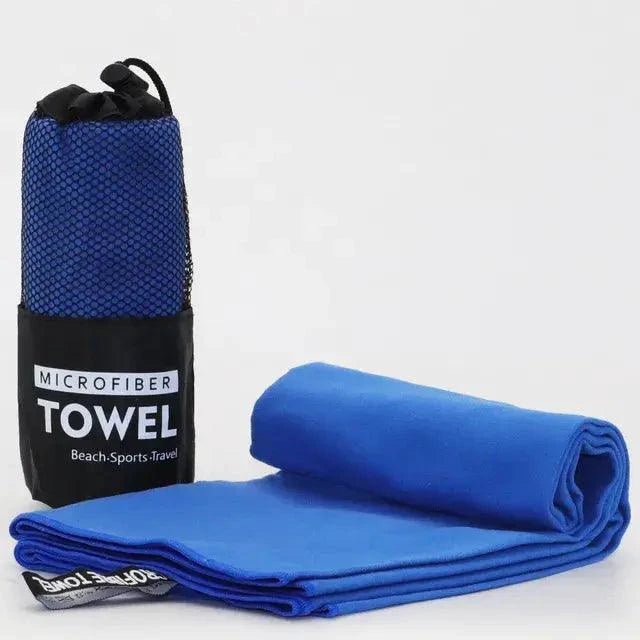 Mandotos Speedy Absorb Microfiber Towel spread out, showing its lightweight, quick-drying fabric ideal for travel and sports use.