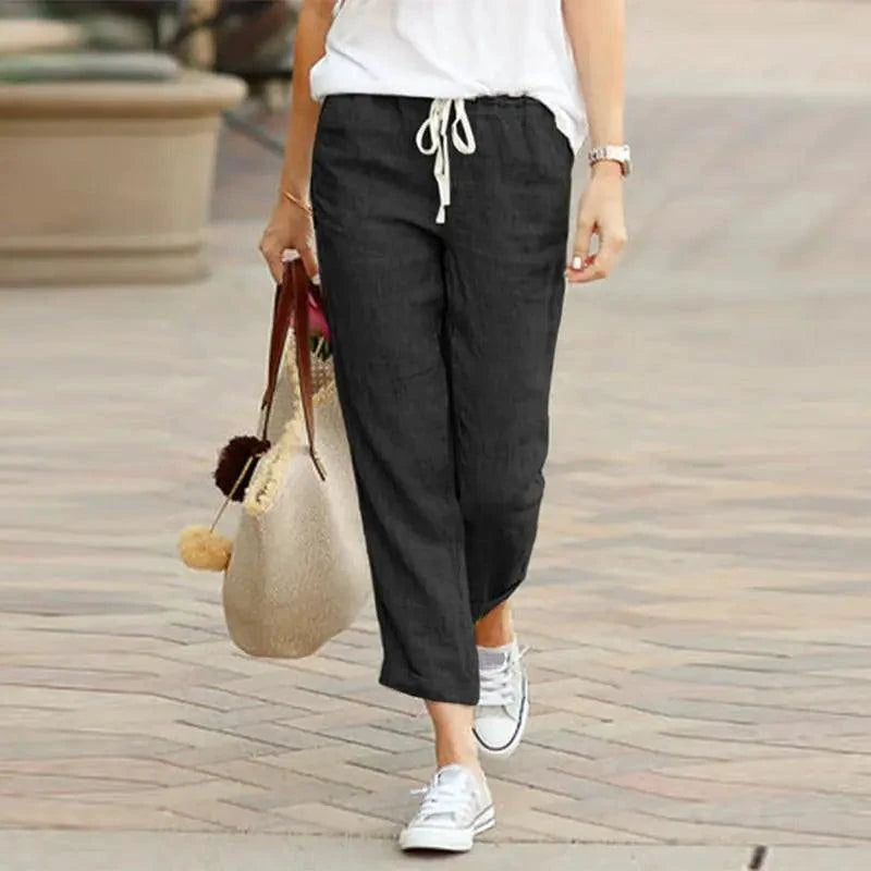 Mandotos Summer Elegance drawstring trousers in lightweight fabric with a relaxed fit and adjustable waistband.