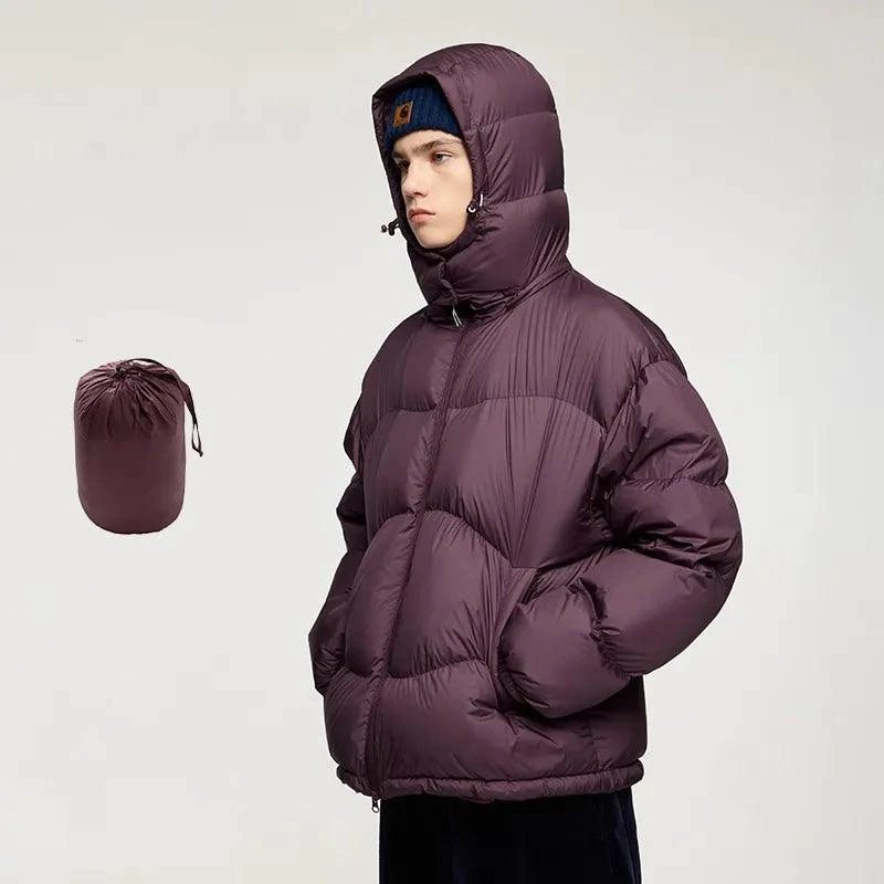 Mandotos thin and portable puff down jacket with solid color, hooded design, lightweight and cozy for cold weather.