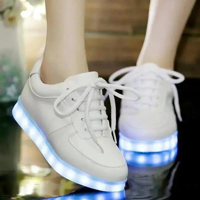 Mandotos white light-up shoes with illuminated soles and stylish design for kids or teens.