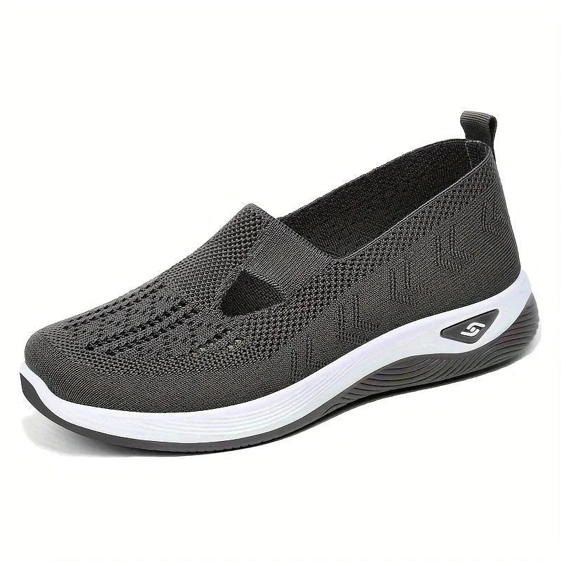 Women's airy mesh sneakers by MANDOTOS featuring lightweight breathable fabric and casual athletic style.