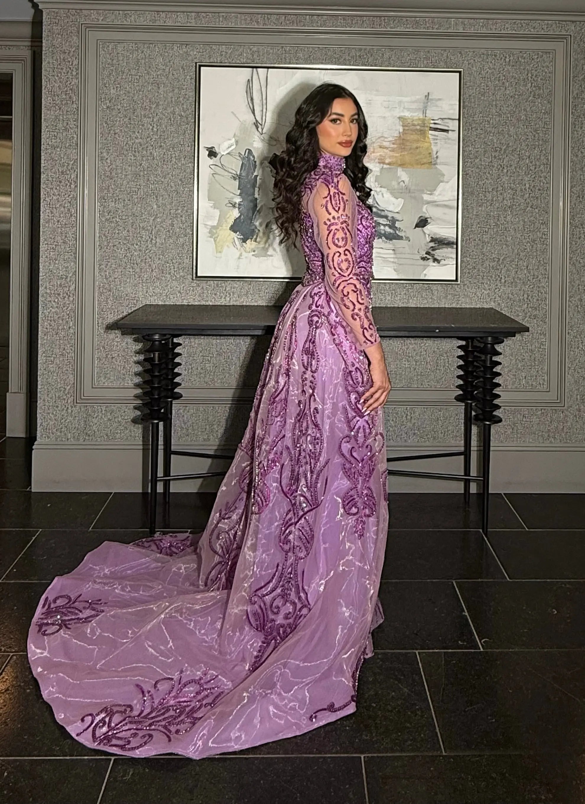 model-wearing-elegant-purple-pink-gown-party-dress
