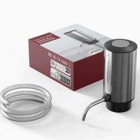 Smart Wine Pourer by Mandotos International; stainless steel electric aerator with curved pour spout and coiled hose.