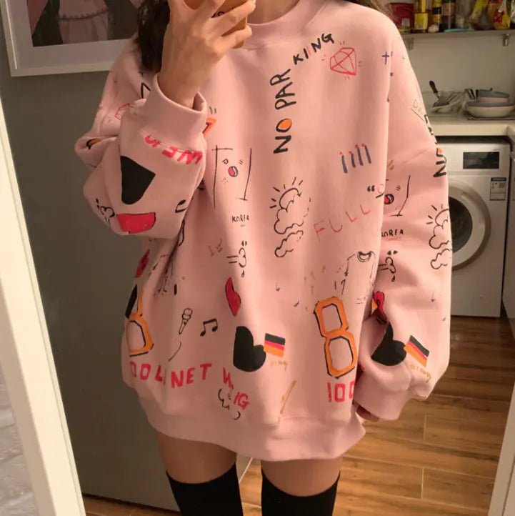 Pink oversized Chic Loose Women's Thick Long Sleeve Sweatshirt Dress with doodle graphics for cozy, casual wear.
