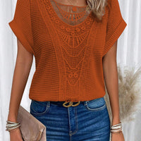 Summer hollow-out short-sleeve T-shirt in orange with intricate ethnic crochet pattern.