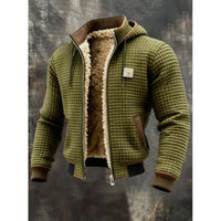 Green quilted bomber jacket for men with shearling lining, hood and brown leather trim by Ancient Energy