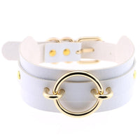 Choker necklace white leather collarbone wrap with gold ring centerpiece and small gold rivets.