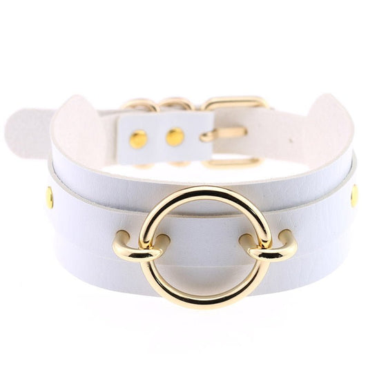 Choker necklace white leather collarbone wrap with gold ring centerpiece and small gold rivets.