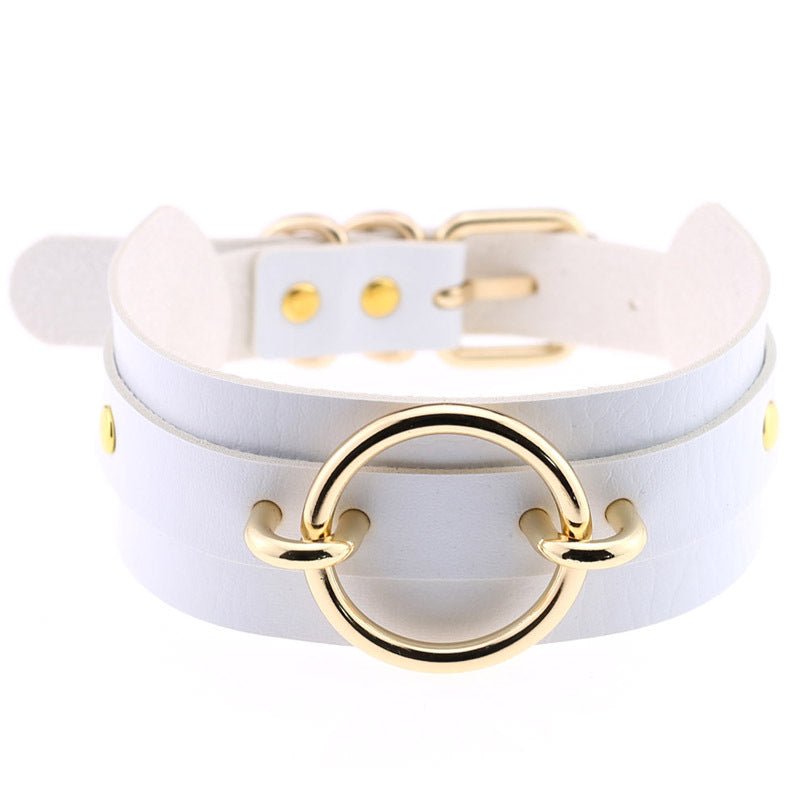 Choker necklace white leather collarbone wrap with gold ring centerpiece and small gold rivets.