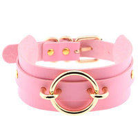Pink women's faux-leather collar choker with gold ring centerpiece, wrap-style