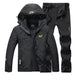 Men's black waterproof two-piece fishing suit with hooded jacket and pants by Ancient Energy.