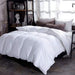 White goose-down winter duvet on a bed with brown pillows in a modern bedroom by Ancient Energy