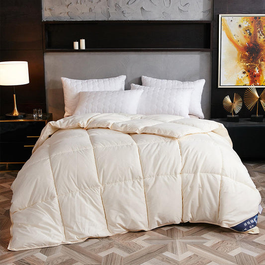 Down Duvet by Ancient Energy, cream goose-down winter comforter on bed
