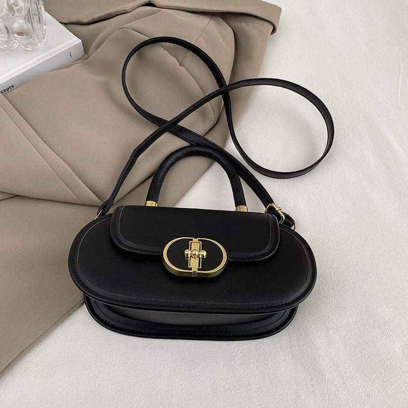 Premium Retro Matte Mini Round Tote Bag in black with gold-tone turn-lock, top handle and crossbody strap.