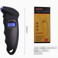 Smart Tire Pressure Monitor handheld digital tire gauge, black with blue LCD display beside yellow packaging box
