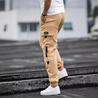 Men's retro jogger cargo pants in tan beige by Ancient Energy with side cargo pockets