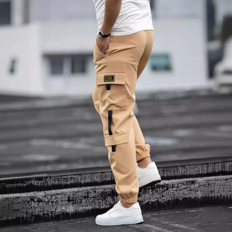Men's retro jogger cargo pants in tan beige by Ancient Energy with side cargo pockets