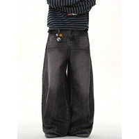 Men's wide-leg relaxed pants in dark denim by Ancient Energy with keychain charm
