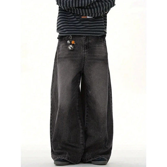 Men's wide-leg relaxed pants in dark denim by Ancient Energy with keychain charm