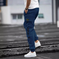 Mens Retro Jogger Casual Work Pants by Ancient Energy, navy blue cargo joggers with side pockets and zip cuffs