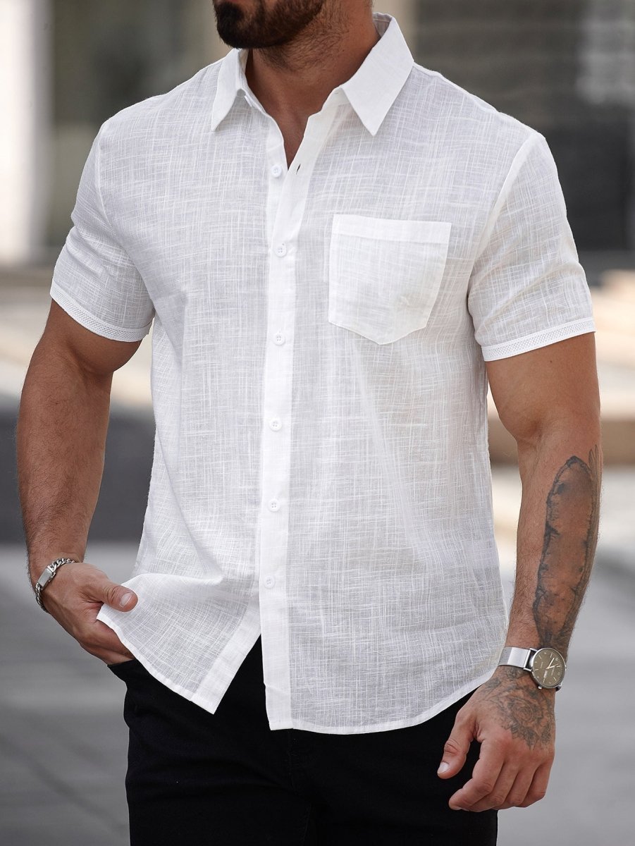 Mens short-sleeve white cotton shirt with chest pocket; lightweight linen-textured fabric.