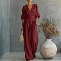 Women's burgundy short-sleeved V-neck jumpsuit with wide-leg pants and wide waistband