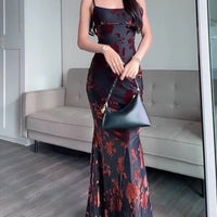 Flocked Strappy Maxi Dress by Ancient Energy; black fabric with red floral flocked pattern.
