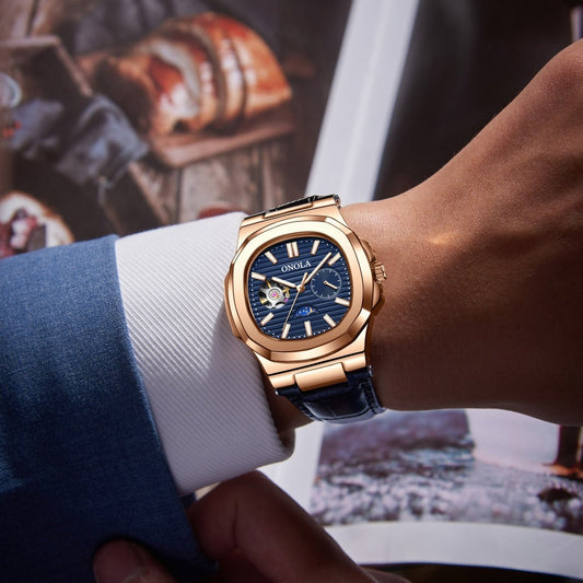 Mechanical watch, rose-gold case with blue dial and leather strap, sun and moon design, ONOLA.