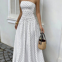 Dress, white with black polka dots; strapless maxi with a fitted high-waist bodice and flowing skirt
