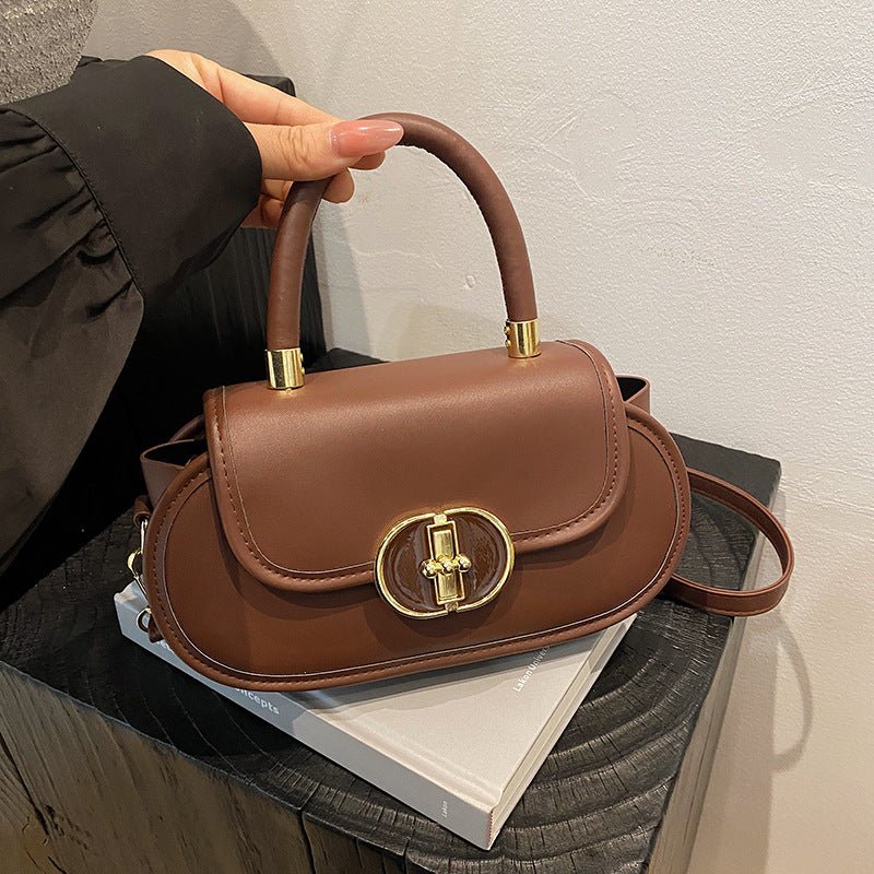Premium retro matte brown tote bag with top handle and gold buckle
