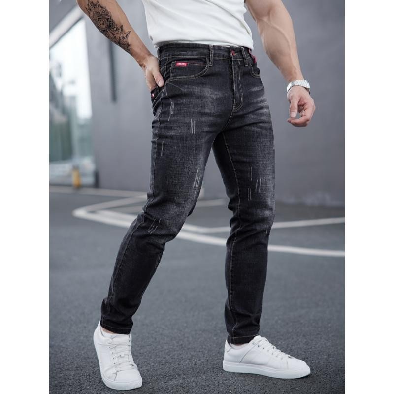 Men's ripped denim jeans with cat-whisker scratches, dark wash, Ancient Energy.