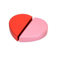 Heart-shaped rotating ring box in red and pink metal halves