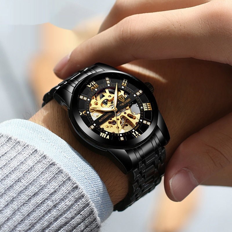 Mechanical skeleton watch with black hollow steel bracelet and gold gears by Ancient Energy