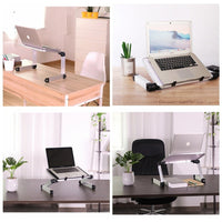 Foldable laptop stand by Ancient Energy; ergonomic silver desk/tablet holder shown across four workstations