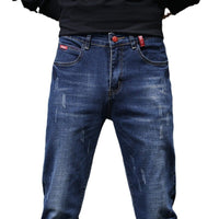 Men's ripped denim jeans with cat-whisker scratches, blue denim, Ancient Energy brand