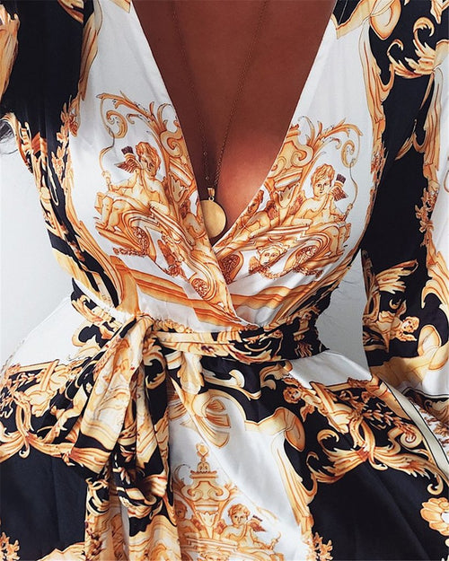Mandotos International chic vintage floral evening dress with V-neck, featuring elegant fabric and intricate floral pattern.