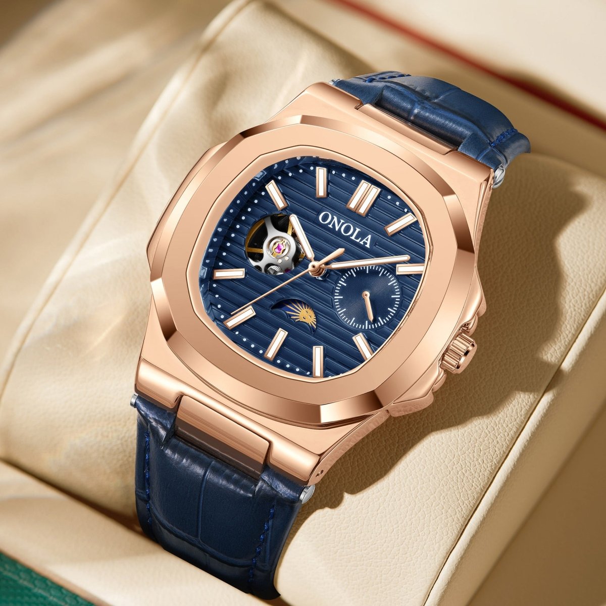 ONOLA mechanical watch with blue sun-moon dial, rose-gold case, and blue leather strap