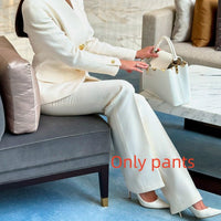 Solid color blazer and high-waisted pants set, white with gold button details
