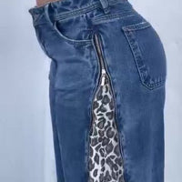 Leopard Print Zip-up Jeans with blue denim and side leopard-panel zip detail by Ancient Energy