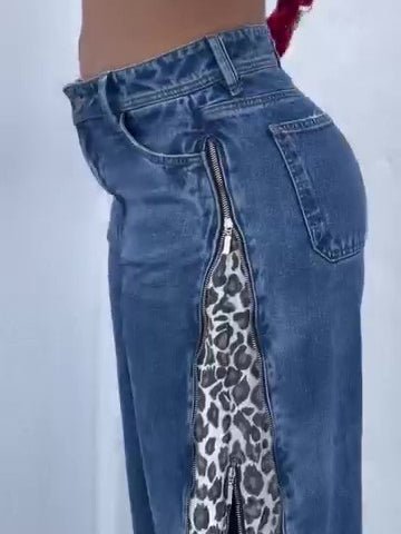 Leopard Print Zip-up Jeans with blue denim and side leopard-panel zip detail by Ancient Energy