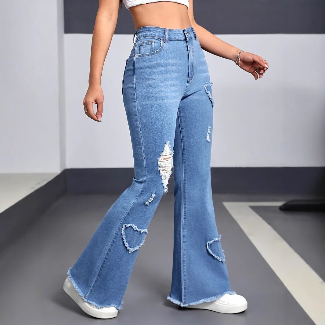 Stylish Casual Denim Jeans For Women in light blue denim, distressed flare with heart patches; Ancient Energy.