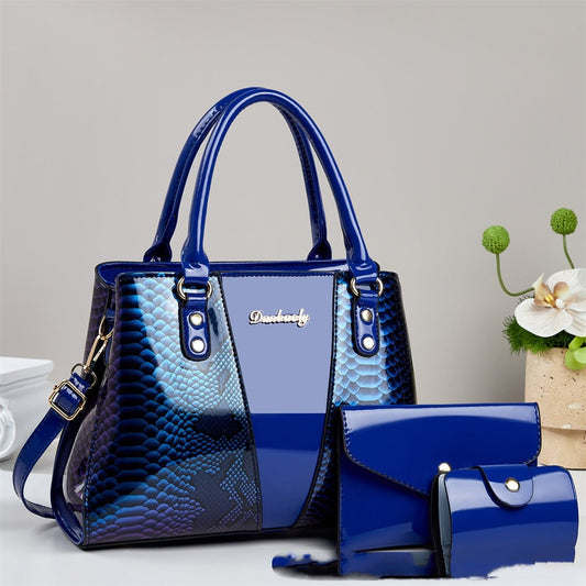 Large blue snakeskin-pattern shoulder bag with matching wallet and small clutch; 3-piece set